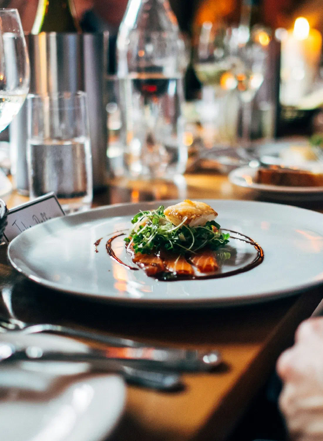 A busy restaurant table — the classic local business customers find on Google Maps