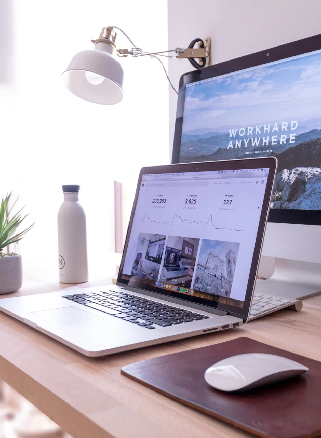A tidy desk with laptop and monitor — a workspace running on professional email
